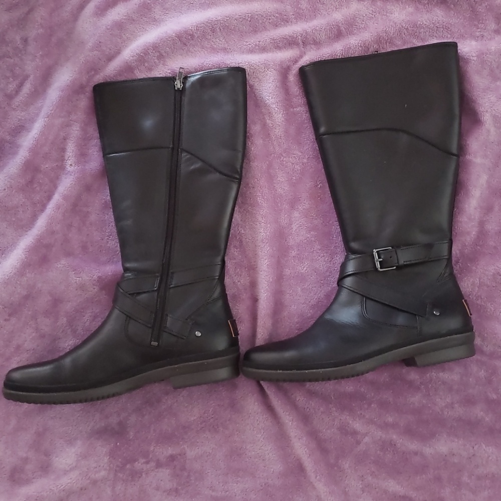 Tall fur lined UGG boots